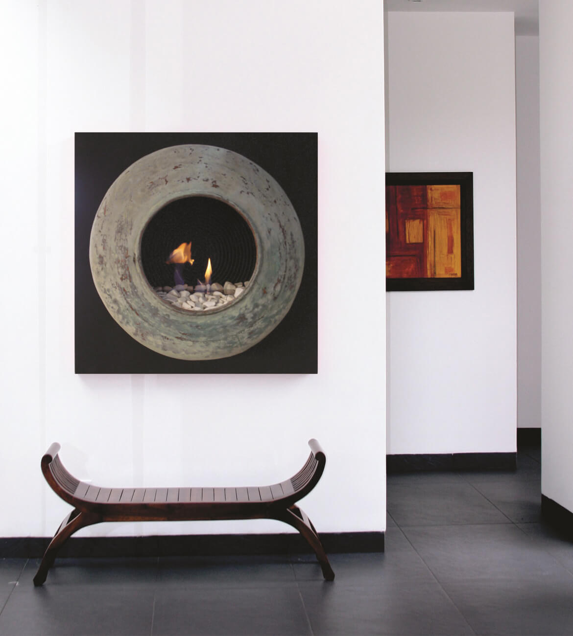 Chimenea Ojo de Fuego en sala moderna - Diseño escultórico bogotano